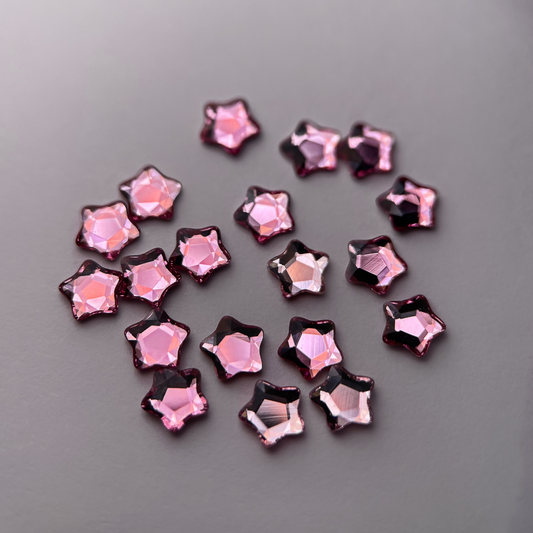 Strass dentaire Swarovski en forme de petite étoile, couleur pink baby, haute brillance, qualité professionnelle.