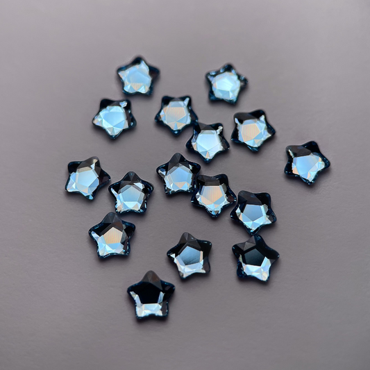 Strass dentaire Swarovski en forme de petite étoile, couleur skyblue, haute brillance, qualité professionnelle.
